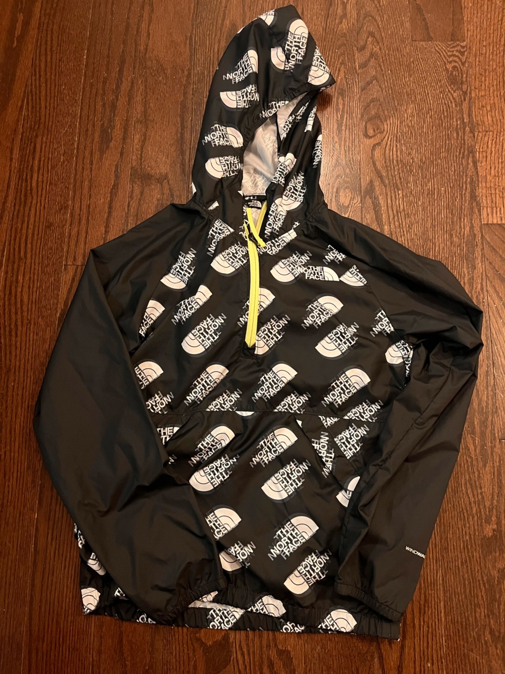 The North Face Black Jacket with White Logo Print and Yellow Zipper Size 10/12
